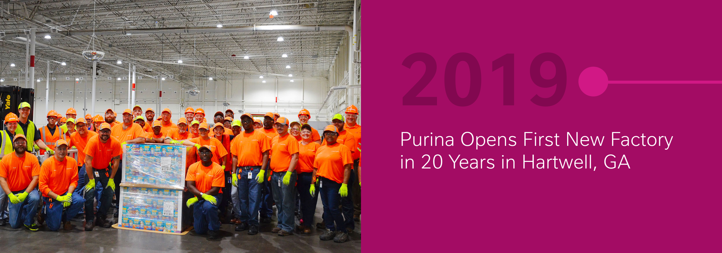 Group of workers in orange shirts. Text reads 2019 Purina Opens First New Factory in 20 Years in Hartwell