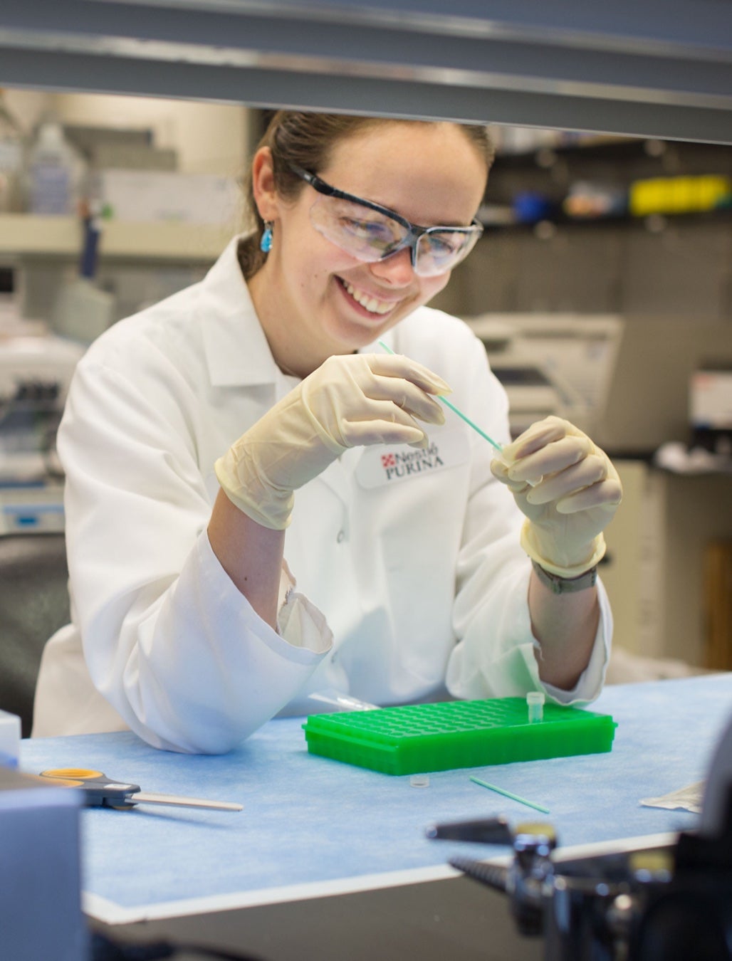 Scientist in a lab coat working in a laboratory