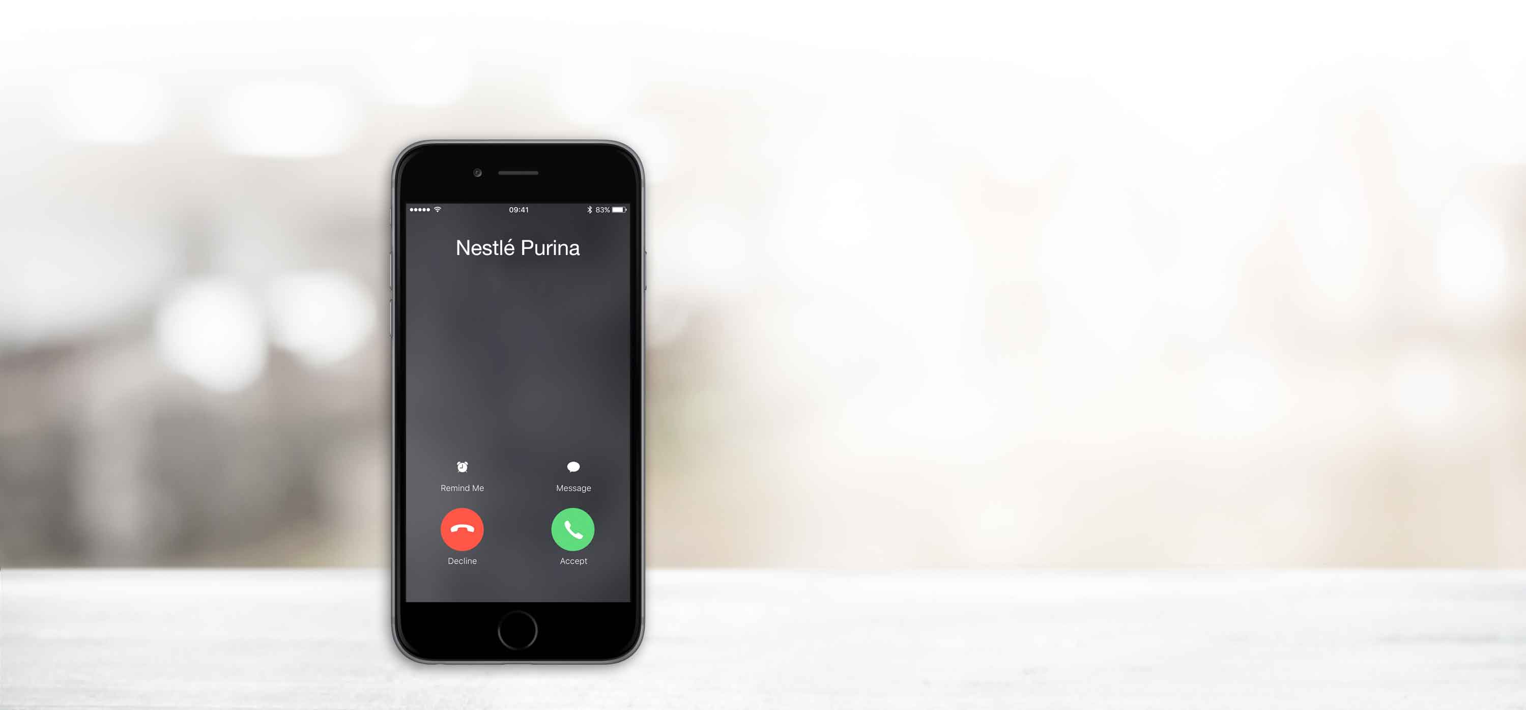 The ringing phone is on the blurred background