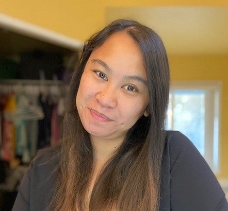 Nestlé employee smiling at the camera