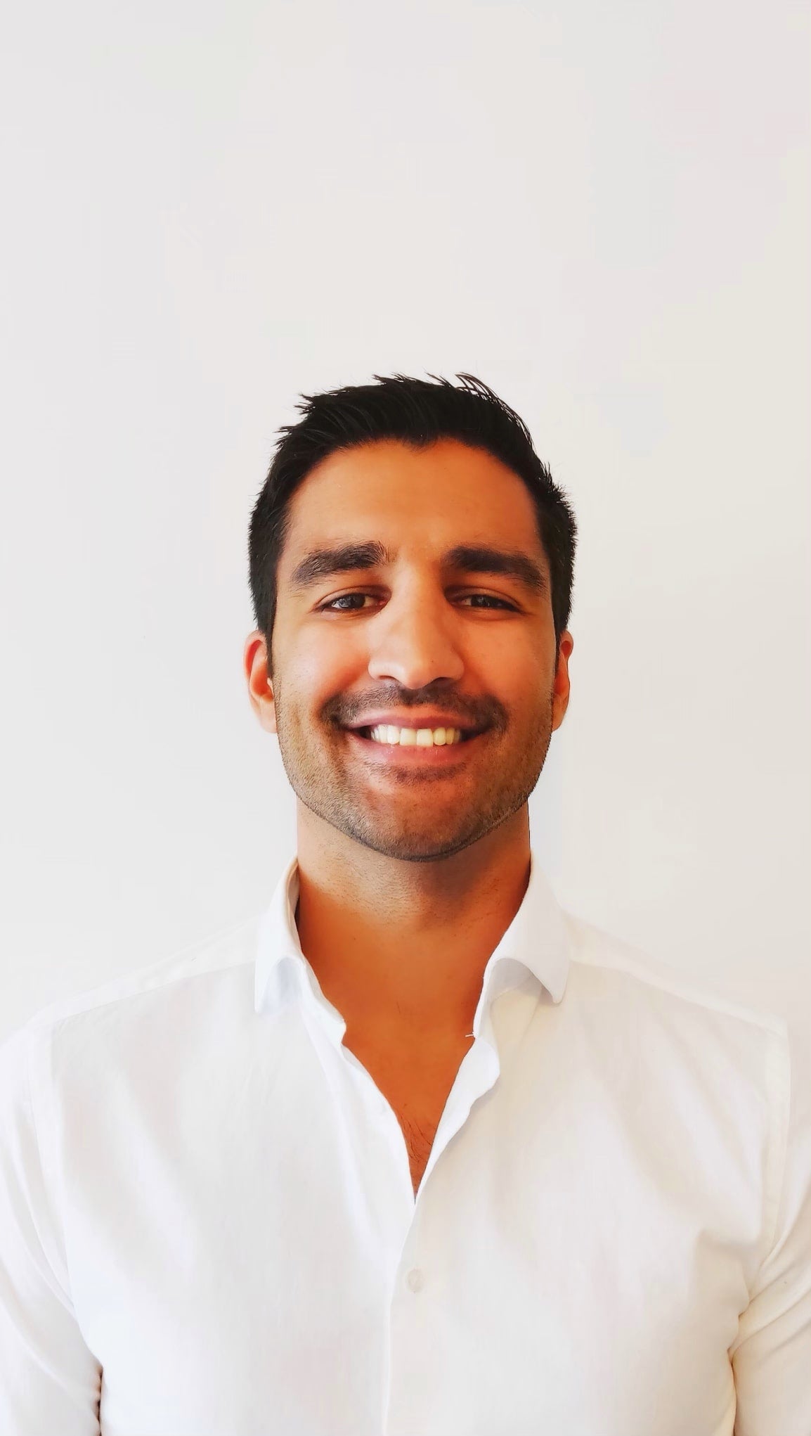 Man smiling for photo