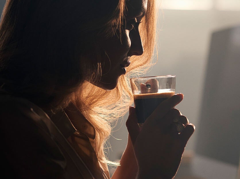 Woman drinking a cup of coffee