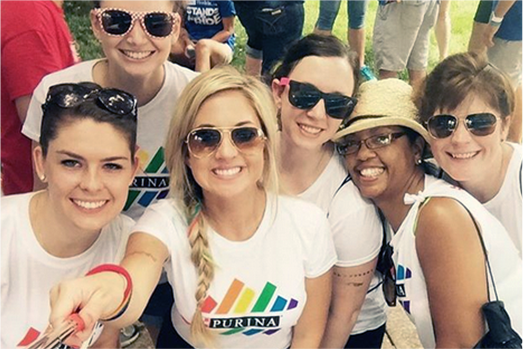 Group of Purina employees taking a selfie during a Pride event