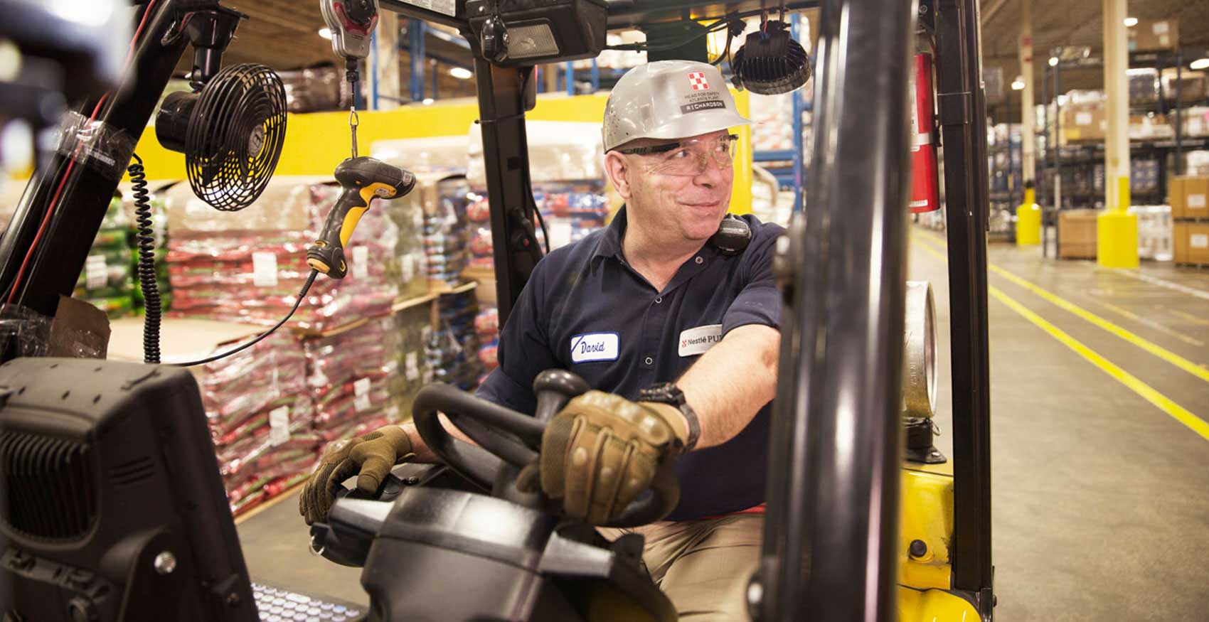 Man operating forklift
