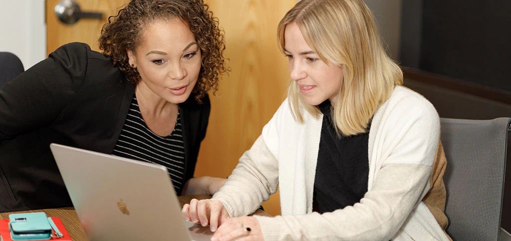 two-womans-look-on-the-computer