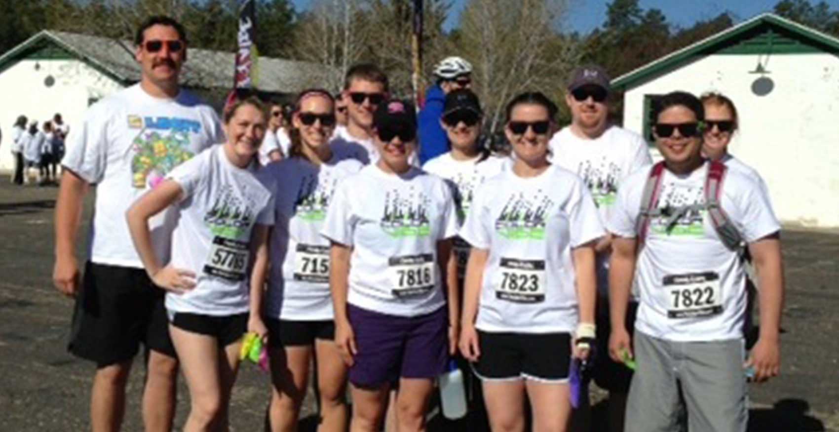 Group of people standing together at race