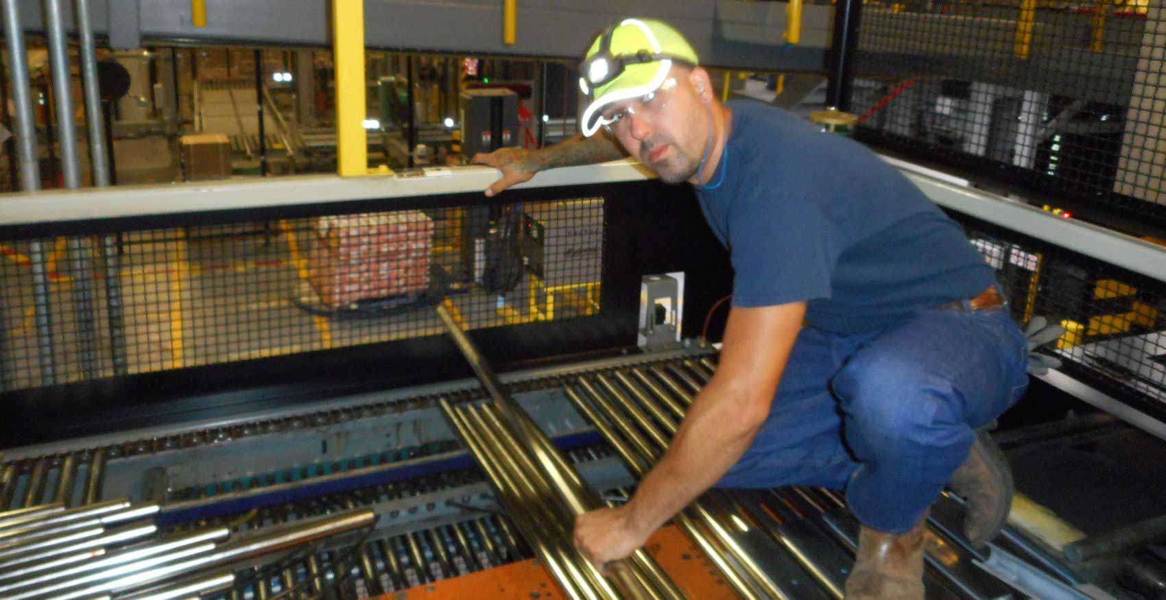 Man working on machinery in factory