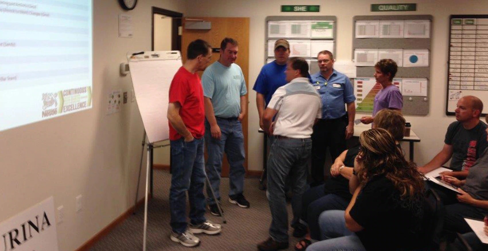 Group of people collaborating in meeting room