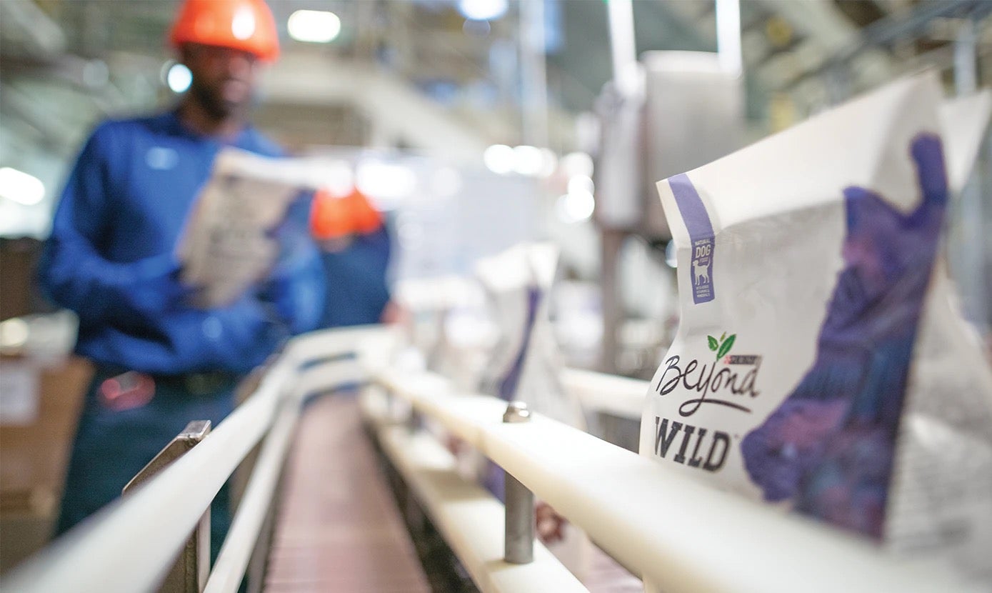 close up of Beyond dog food on assembly line