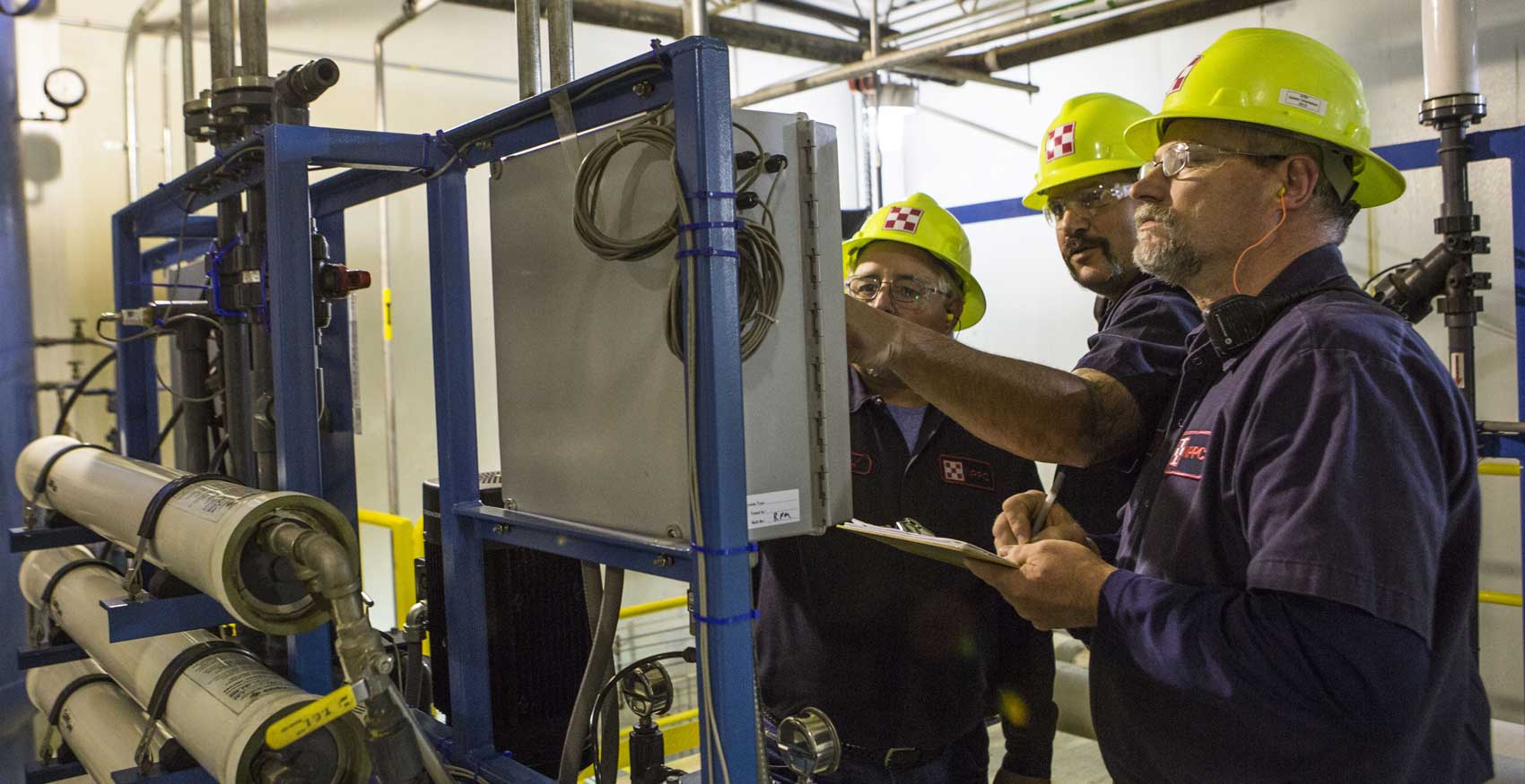 Group of people working on factory floor