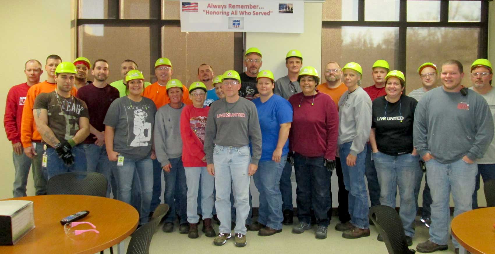 Group of associates standing and smiling