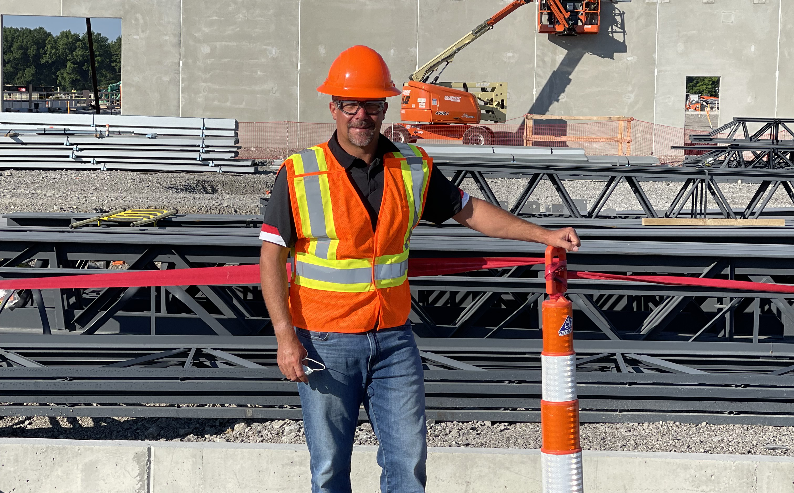 Man standing outside of Factory