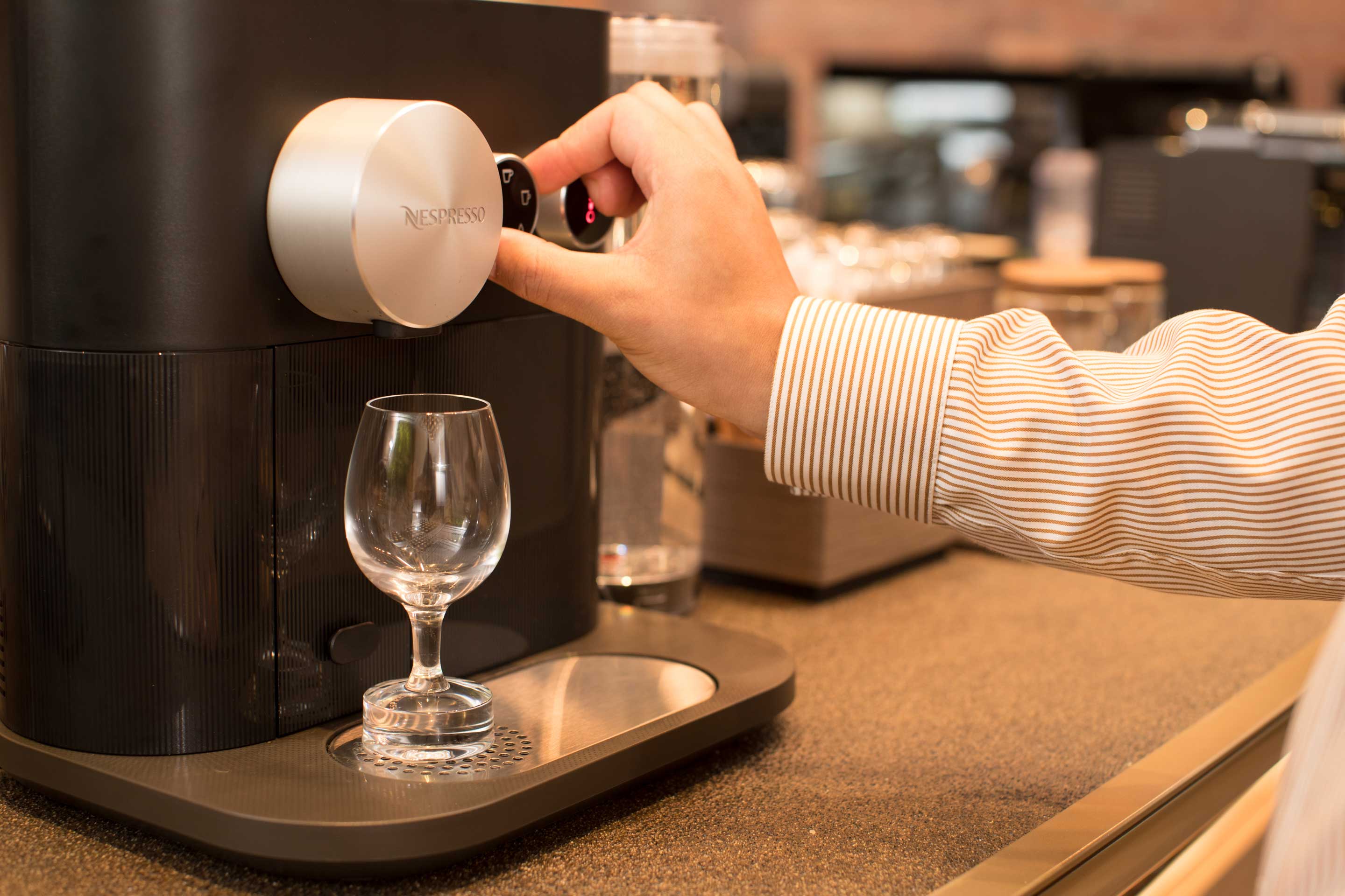Turning knobs on Nespresso Machine