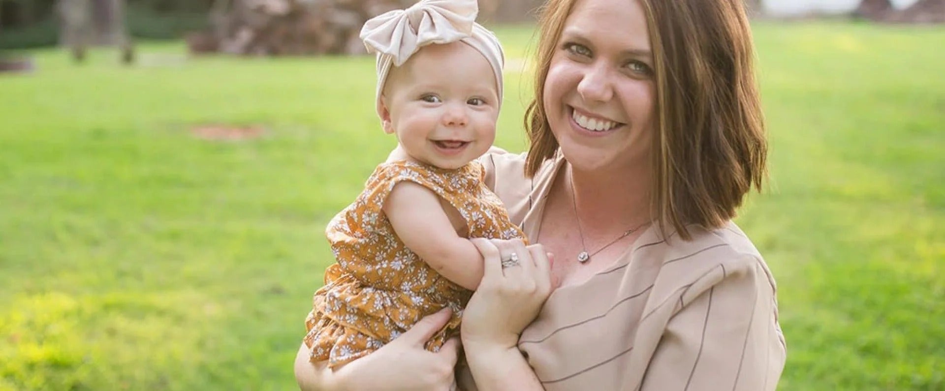 Mom holding her baby daughter