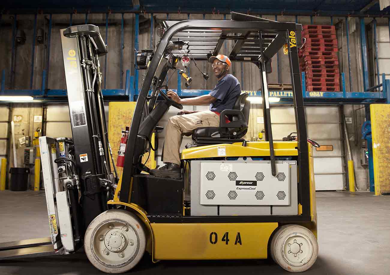 Man driving forklift