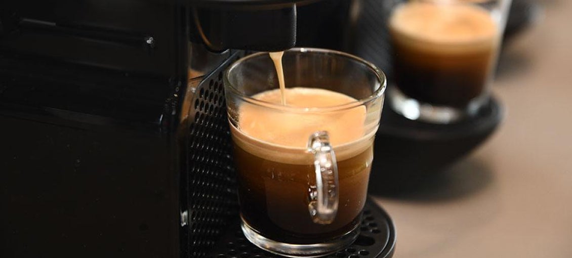 Nespresso brewing into glass