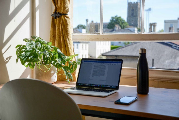 laptop on desk at home