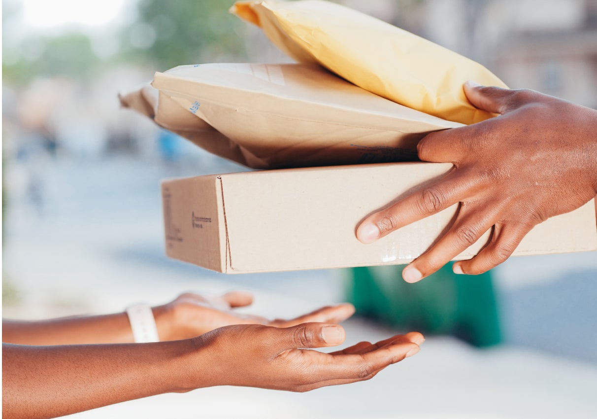 Handing over a stack of packages