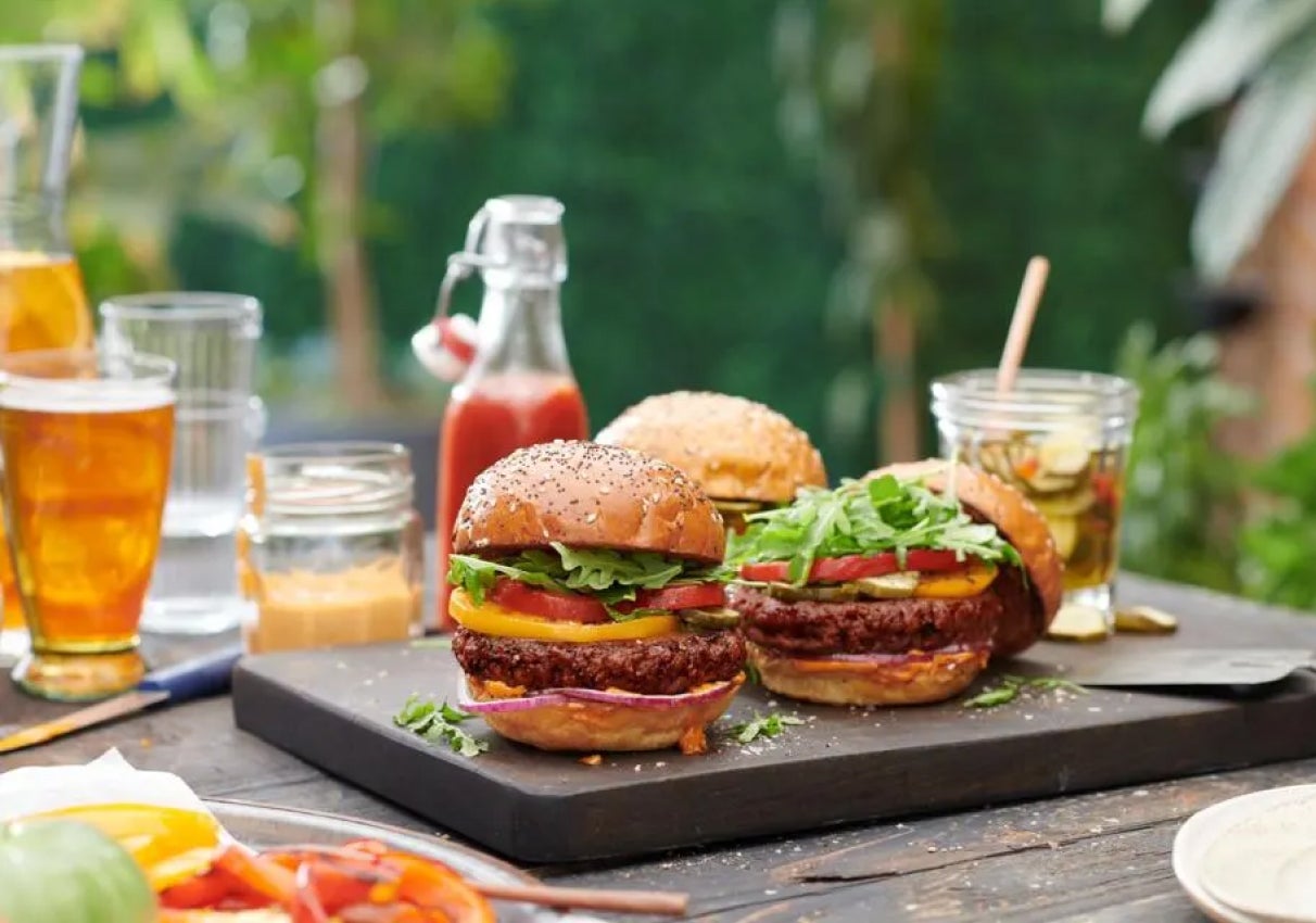 Two hamburgers on a table