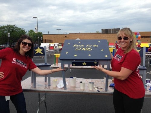 Two Purina employees volunteering