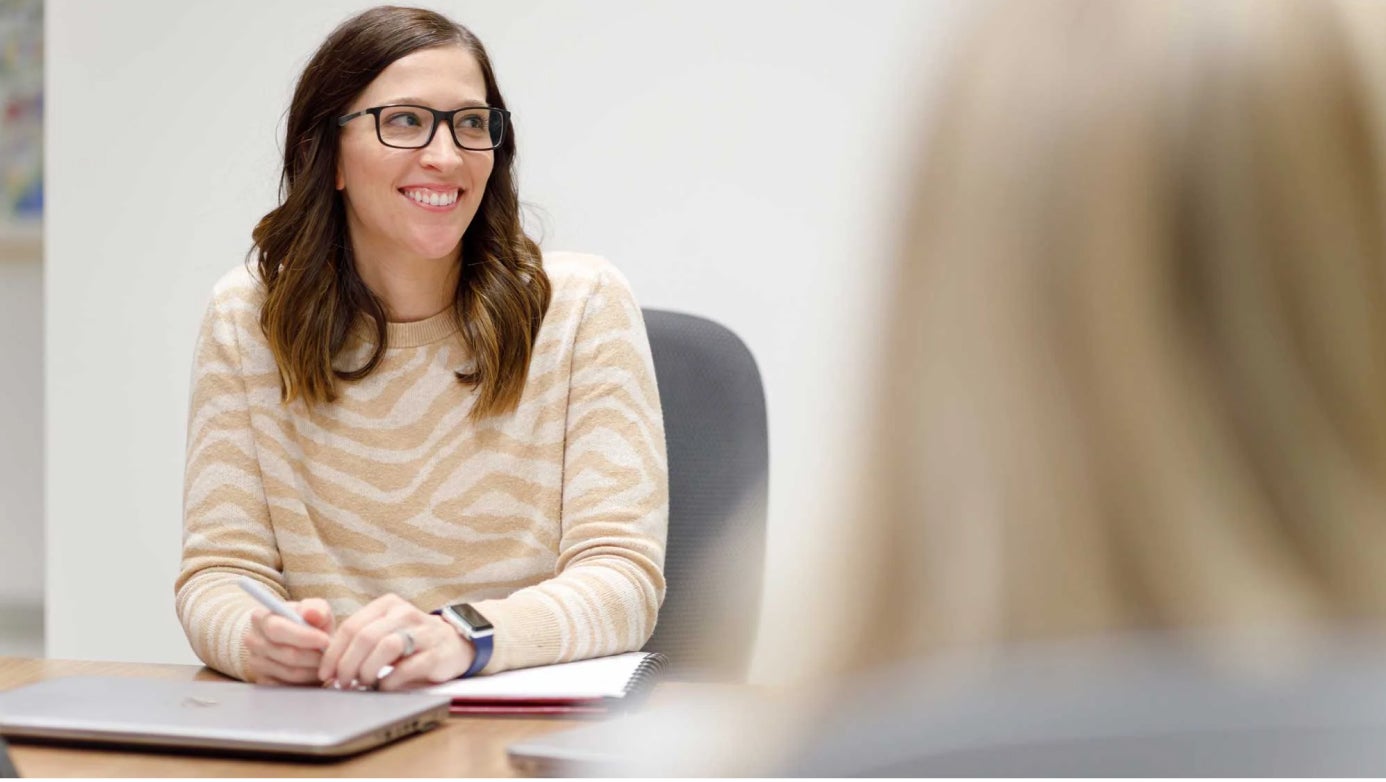 Female contractor in a meeting