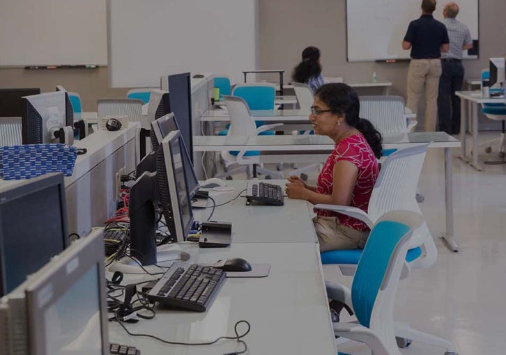 IT employee working at computer