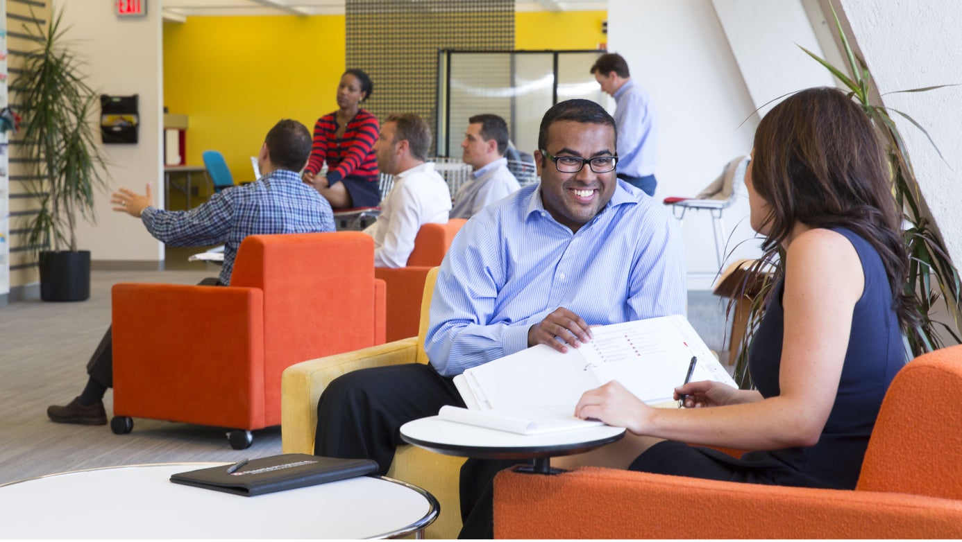 employees meeting in a public workspace