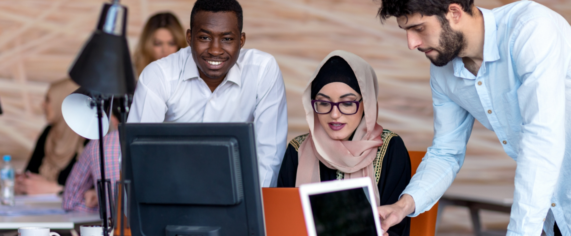 Colleagues working as a team in the Nestlé office