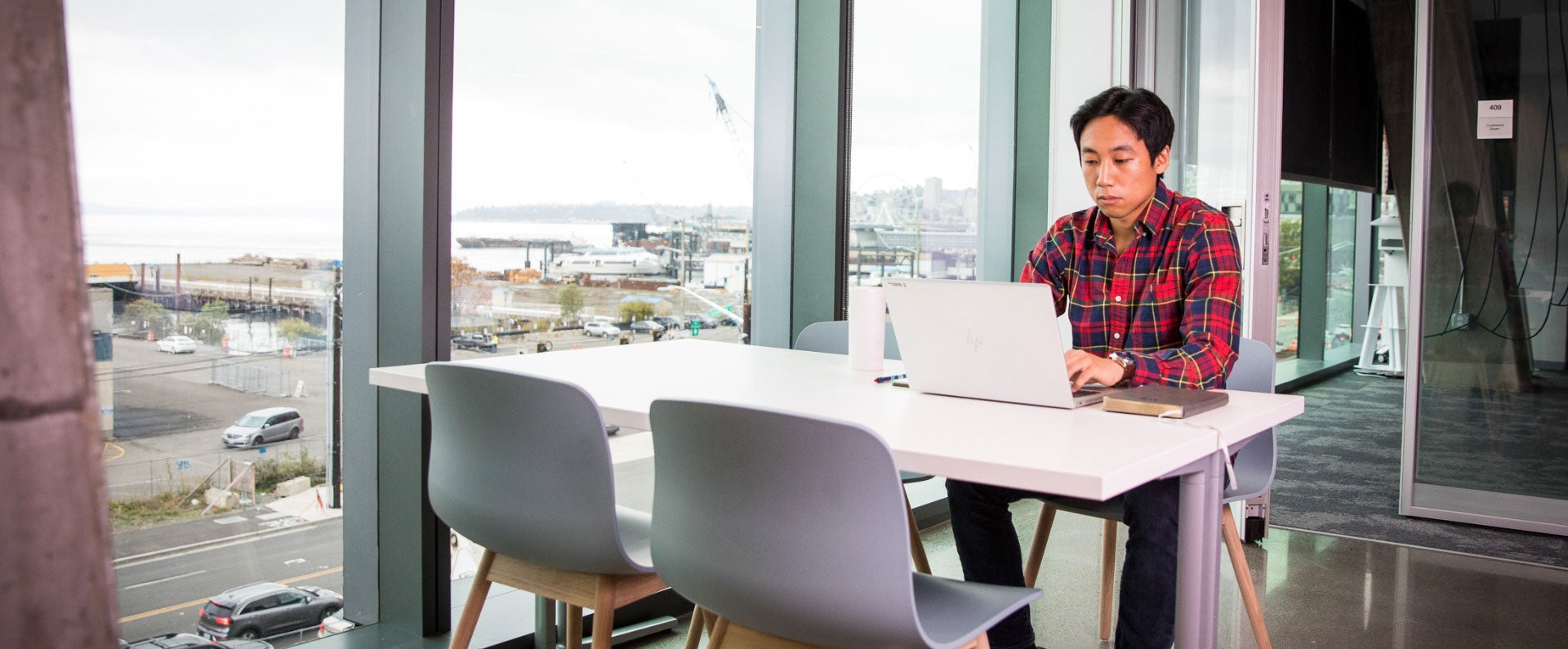 Man working on his resume on his laptop