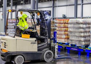 Forklift worker moving pallets