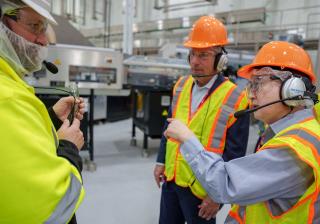 Nestle employees getting tour at Glendale Coffee Mate factory