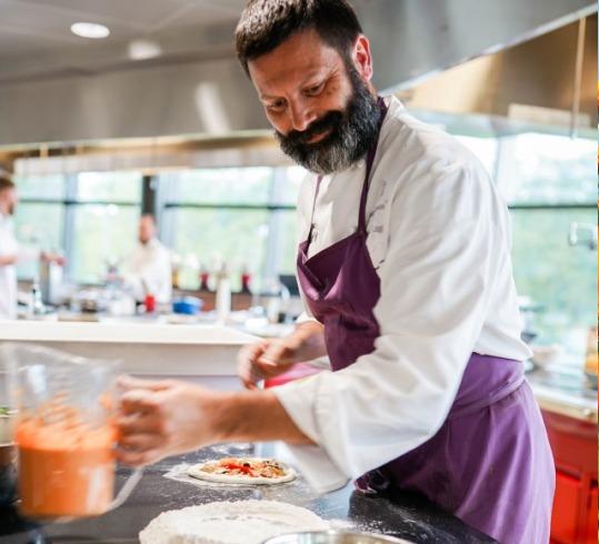 Nestle chef preparing food in the kitchen