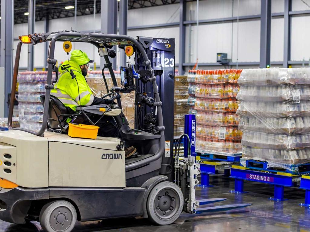 Forklift worker moving pallets