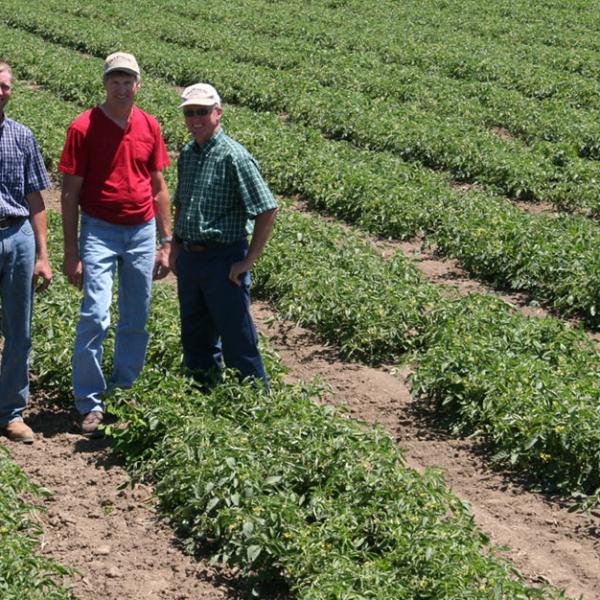 Farmers smiling at camera