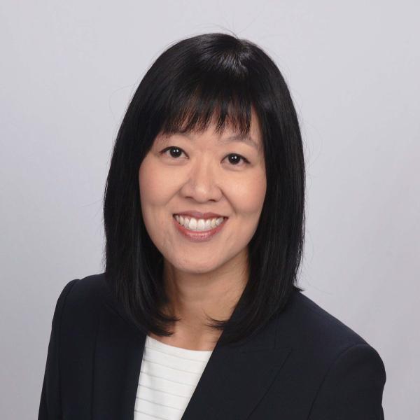 nhs-winnie-testimonial Woman smiling for photo