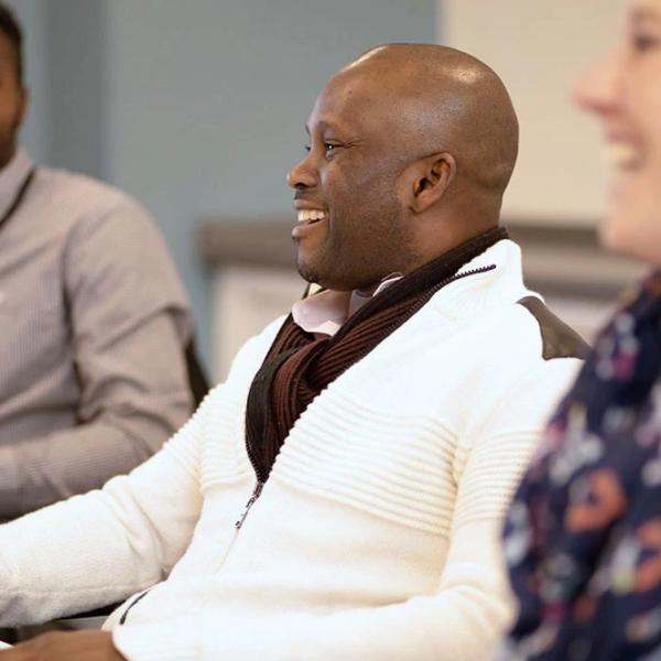 hero Nestlé employee smiling at the camera