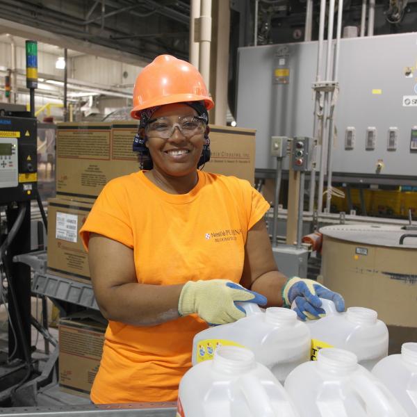 Associate working in warehouse at Purina