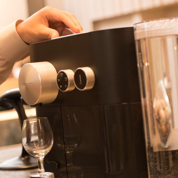 Making Nespresso with machine Making Nespresso with machine