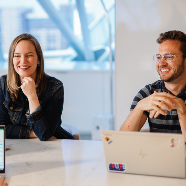 Interns collaborating at table