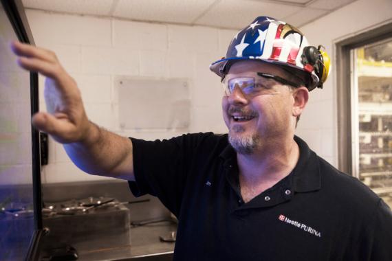 Purina employee wearing a USA hard hat