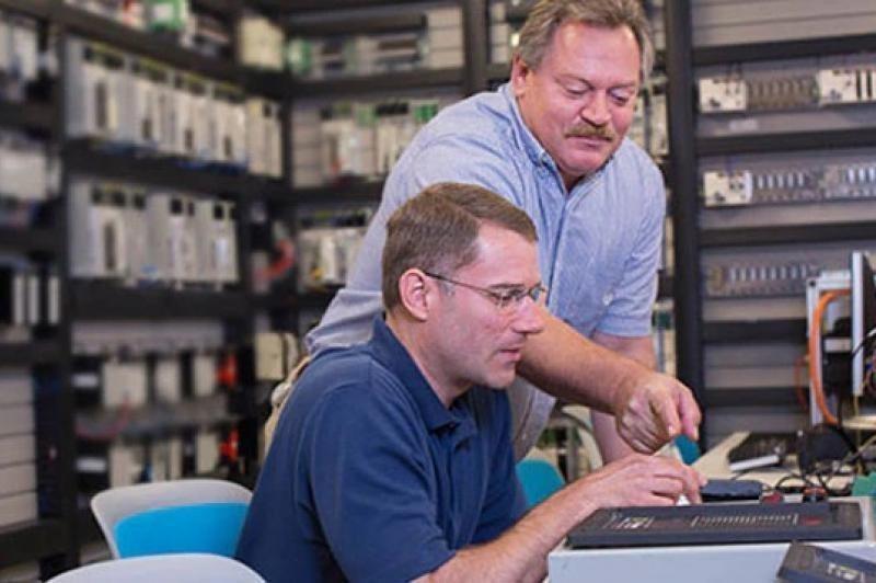 Purina IT employees reviewing equipment