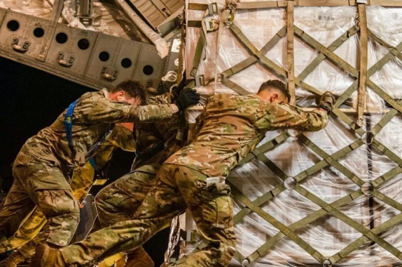 Military men working together