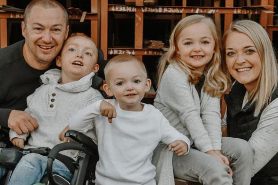 Purina family with child in wheelchair