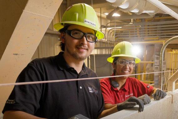 two nestle purina factory workers