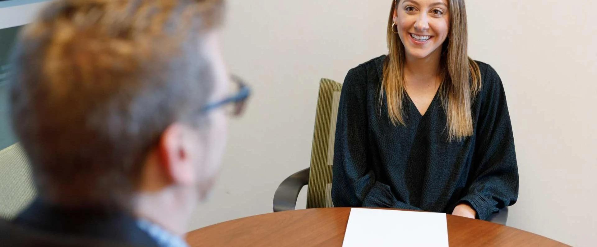 Man and woman reviewing resume