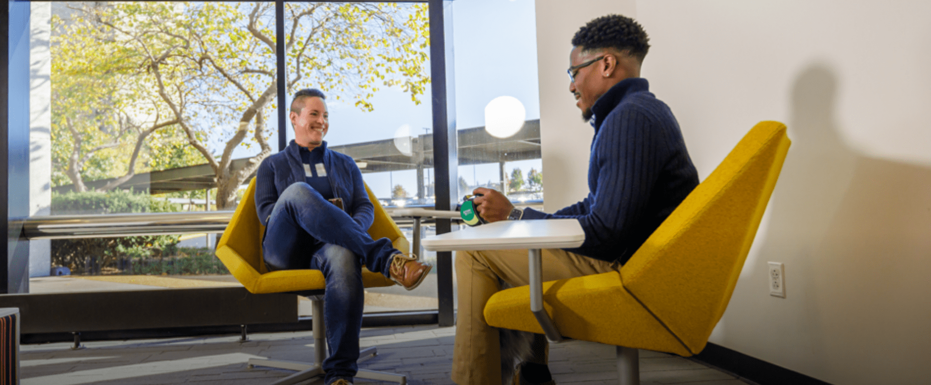 Two employees meeting casually about mental health