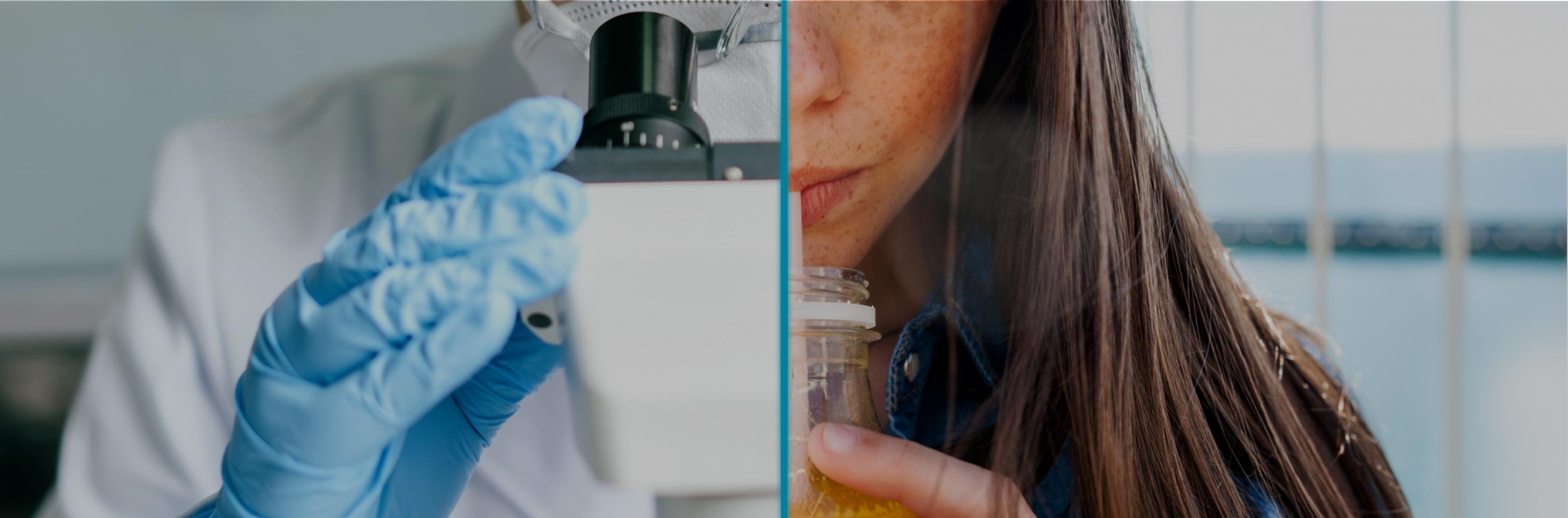 Female scientist looking through a microscope